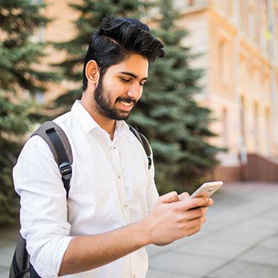 Student Hold Mobile Device